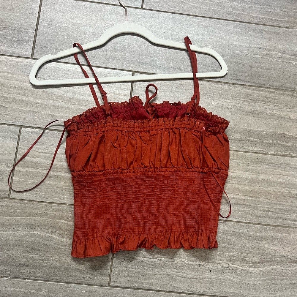 NWT Medium top. Cute with high waisted jeans.